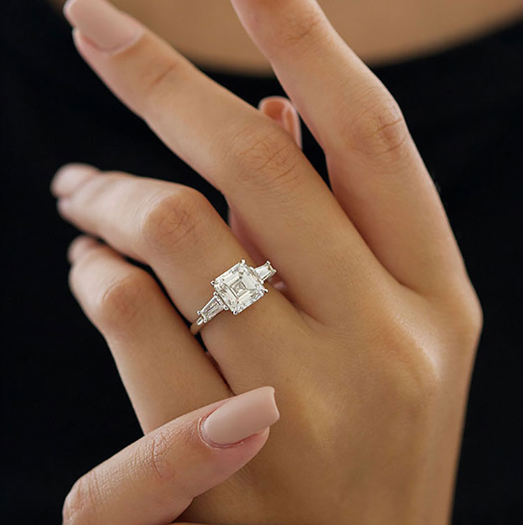 three stone halo engagement ring